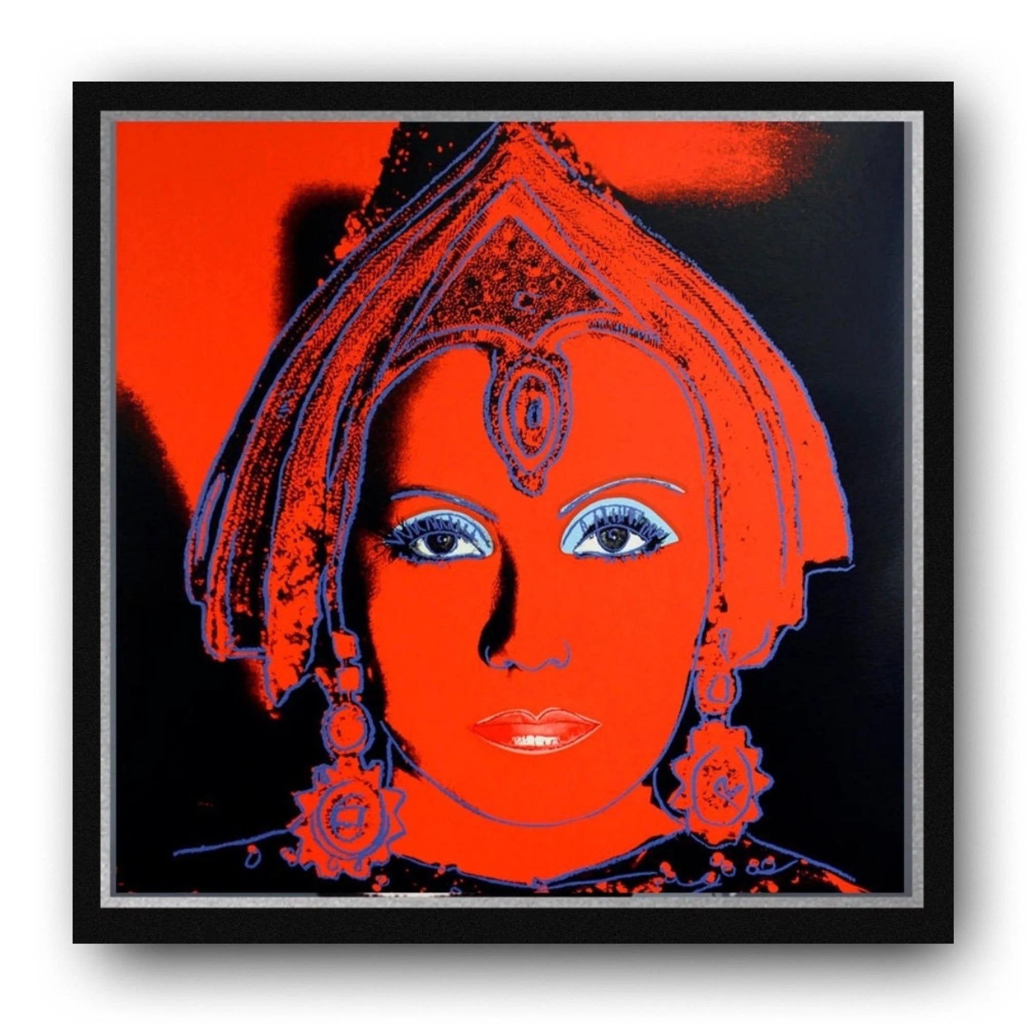 Framed artwork of a stylized face with orange and black colors on a white background